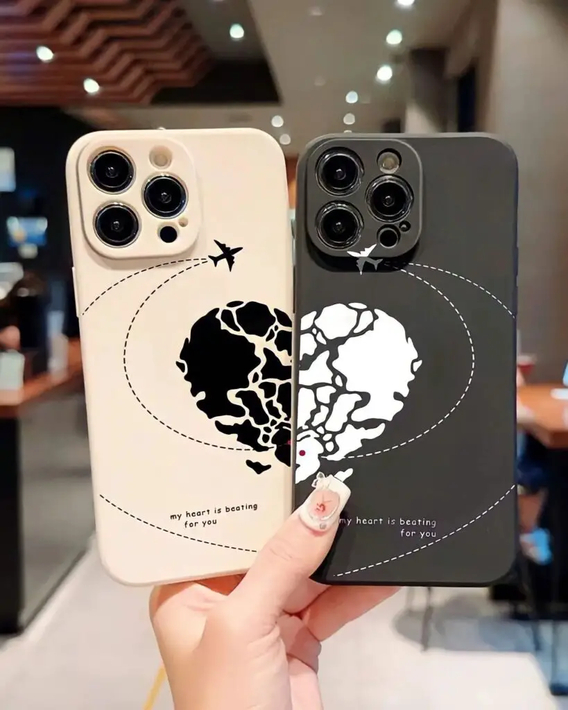 A pair of iPhone cases, each with half of a world map and flight paths, symbolizing love and connection across global distances.