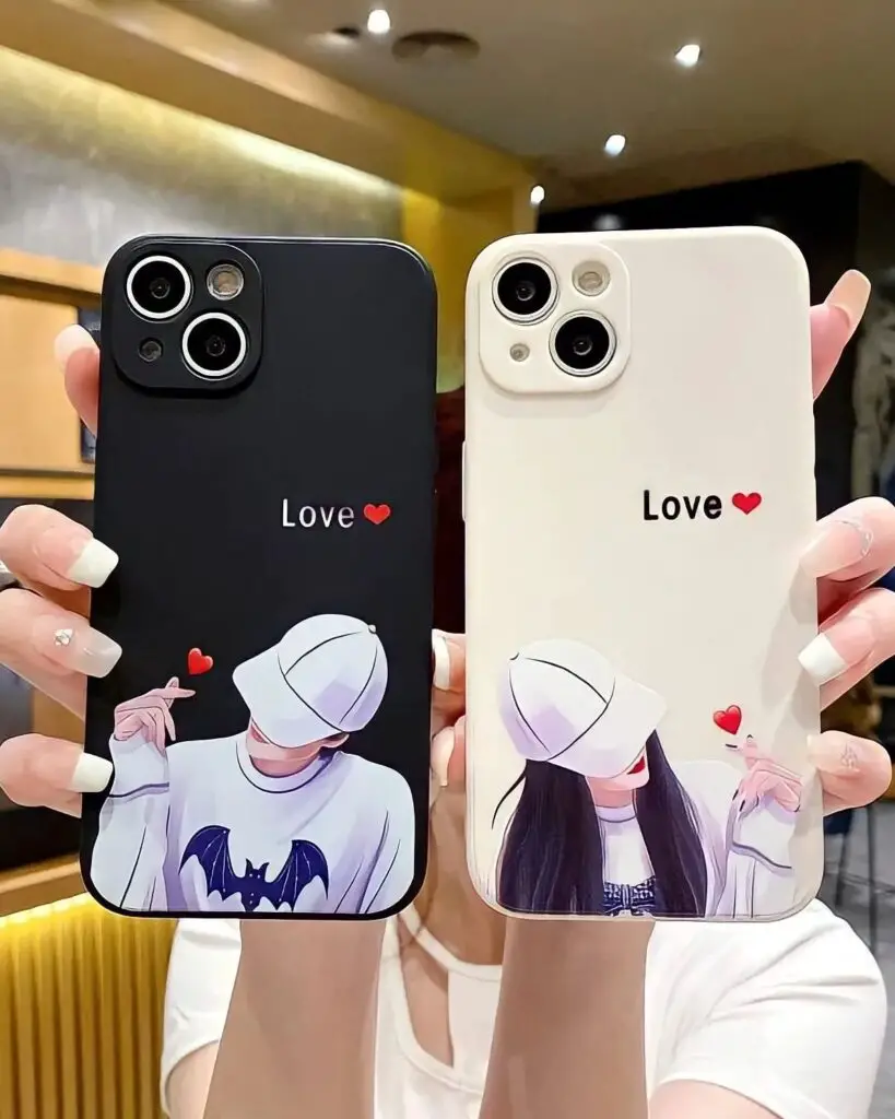 Two iPhone cases with illustrations of a couple in modern clothes, forming a heart with their gestures against contrasting black and white backgrounds.