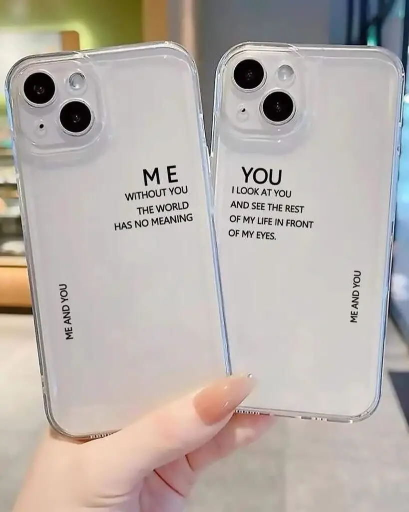 Two clear iPhone cases with romantic quotes, one saying 'Me without you, the world has no meaning' and the other 'You, I look at you and see the rest of my life in front of my eyes'.