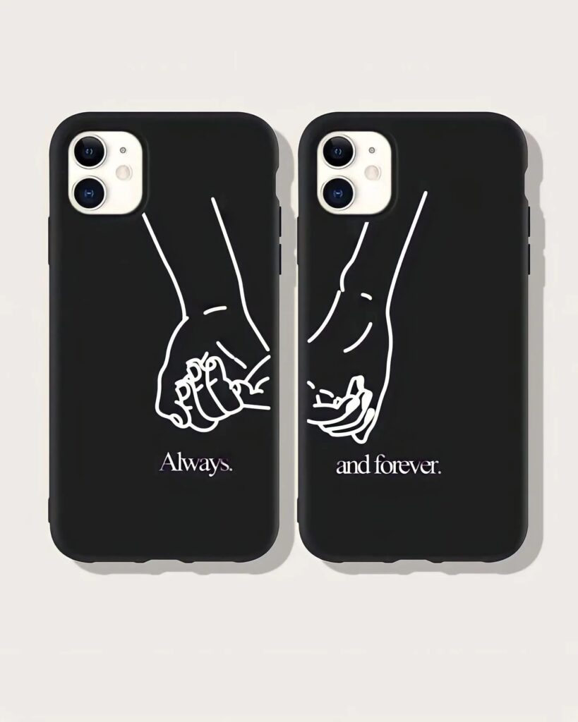 Two black smartphone cases with white line drawings of hands holding, inscribed with "Always." and "and forever."